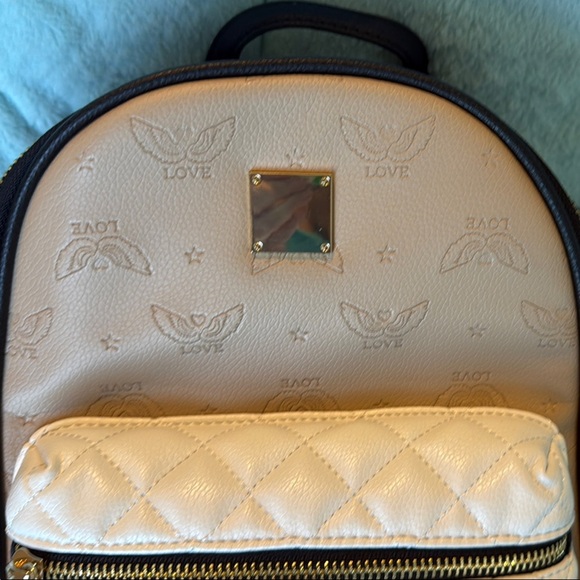EUC Icing Tan, White, & Black Backpack Purse - Picture 3 of 7